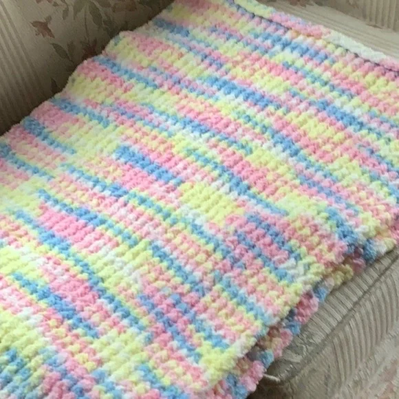 White handmade, multicolored, vibrant, soft, comfortable blanket
